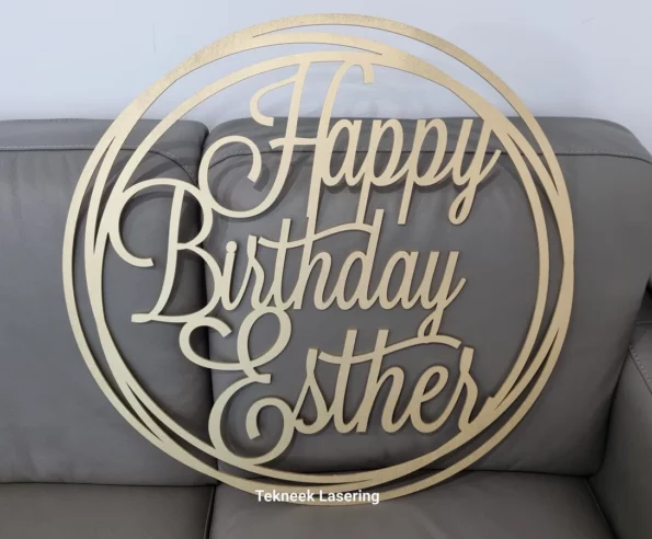 Happy birthday gold sprayed sign