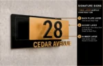 Black and gold three-layer acrylic house number sign showing the back plate, accent layer and raised number layer.
